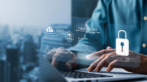 Cybersecurity man at keyboard
